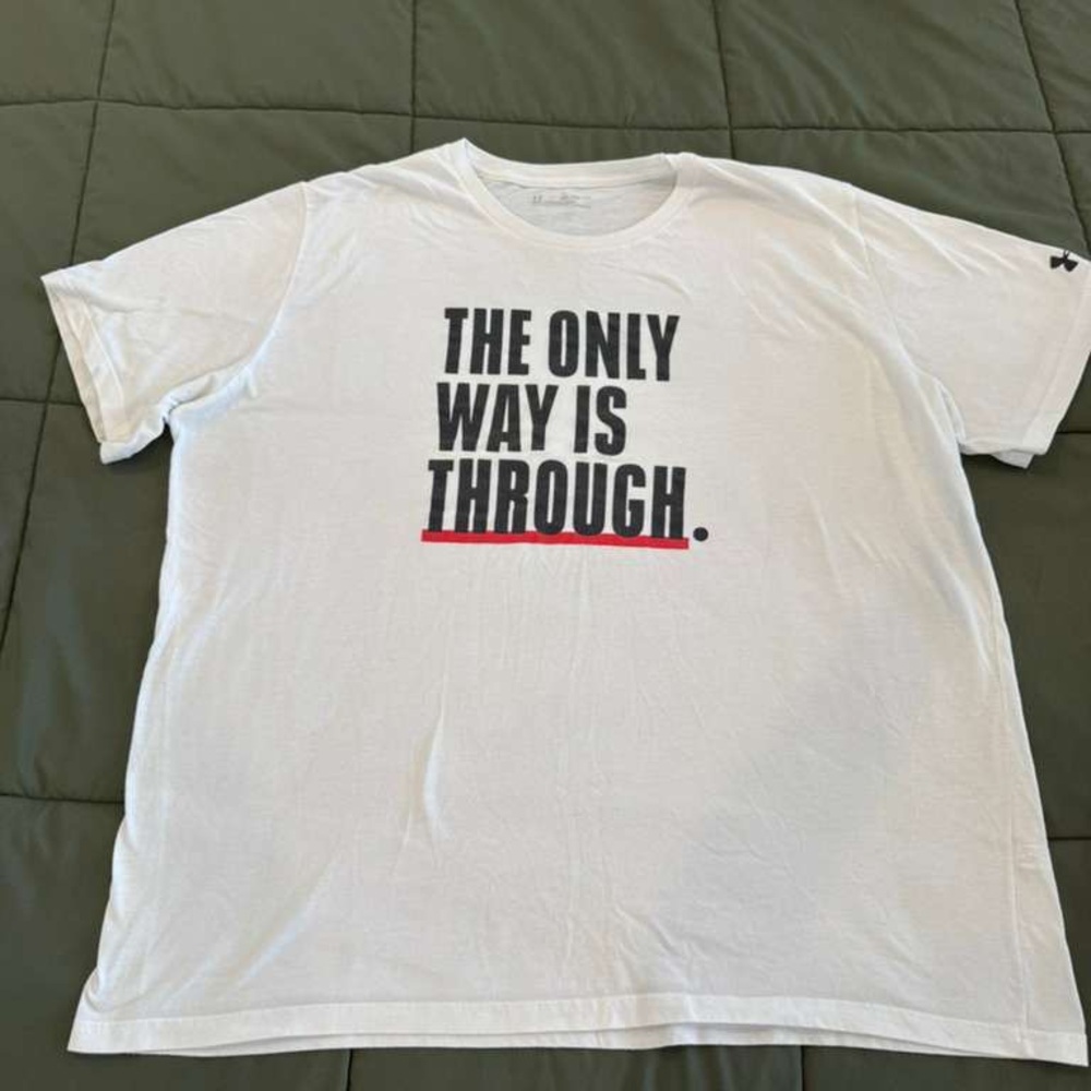 Under Armour White Short-Sleeve Graphic Tee with Black Text and Red Accent